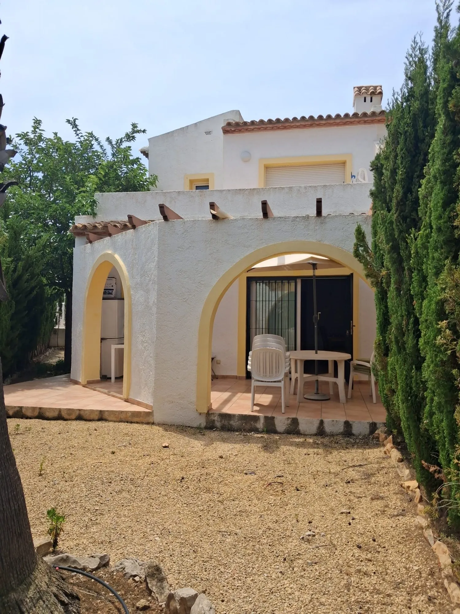 Bungalow con jardín privado y piscina comunitaria